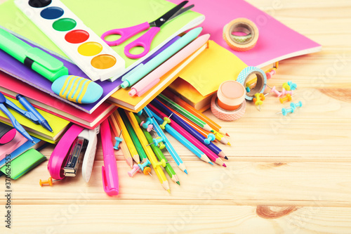 School supplies on brown wooden table