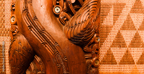 Carved panels inside of Maori meeting house in Waitangi, New Zealand