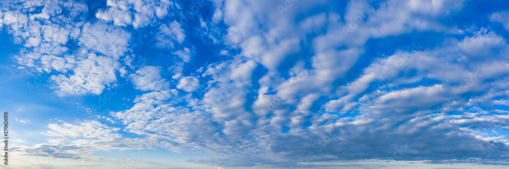 Magnificent magical panorama of blue skies at day with white clouds Magnificent magical panorama of blue skies at day with white clouds