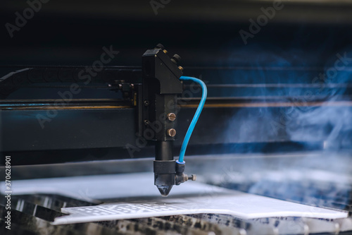 Wallpaper Mural Automated self working laser cutting machine during progress. Torontodigital.ca