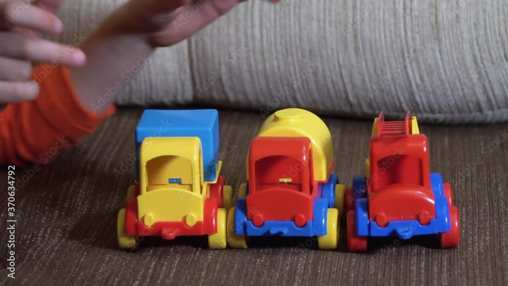 little girl plays with cars little girl plays with cars