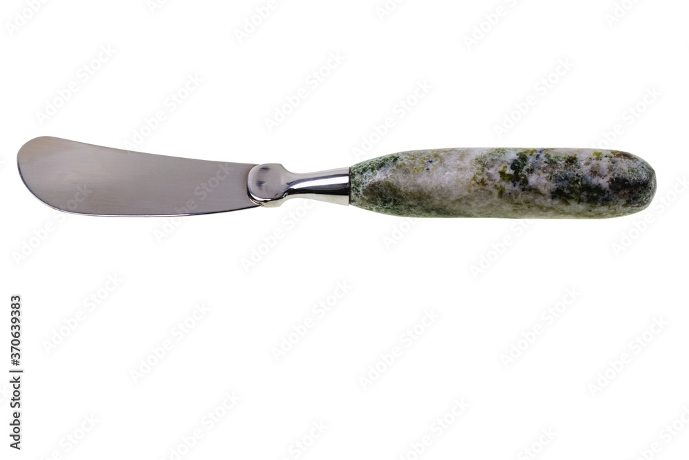 Fototapeta premium Close up view of handmade butter knife on white background. Kitchen supplies concept.