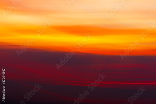 Abstract and colorful blurry sky background with sunset sunset light