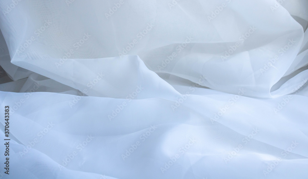 Light white beautiful elegant luxury fabric. Fabric texture, abstract background design Light white beautiful elegant luxury fabric. Fabric texture, abstract background design