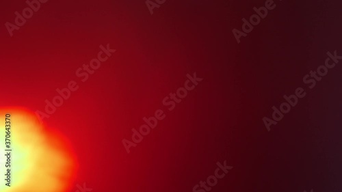 Close up of orange spotlight beam flaring