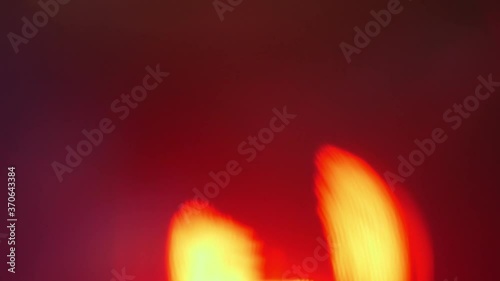Close up of orange spotlight beam flaring