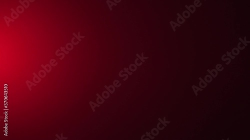 Close up of red spotlight beam flaring