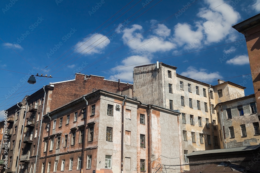 Old shabby apartment houses typical for Saint Petersburg