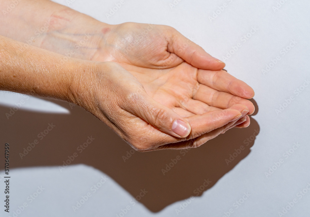 Fototapeta premium empty woman's hands in the helping position