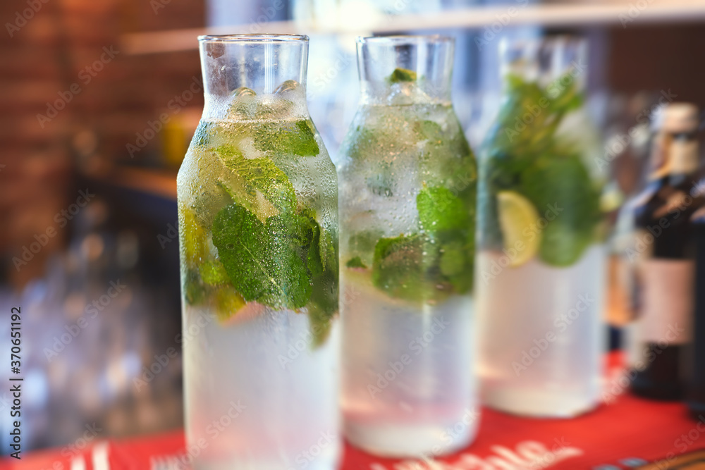 View of lemonade bar on a catering banquet table on party event, beverage selection variety on a party event