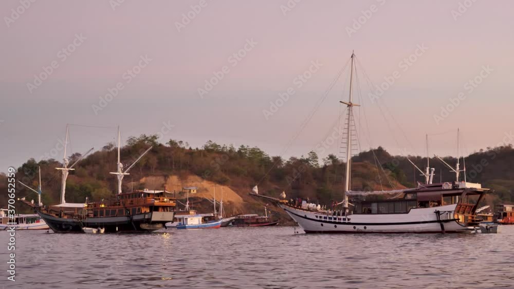 Adventure Live Aboard Boats Docked In Harbor, Labuan Bajo, Flores Indonesia Adventure Live Aboard Boats Docked In Harbor, Labuan Bajo, Flores Indonesia