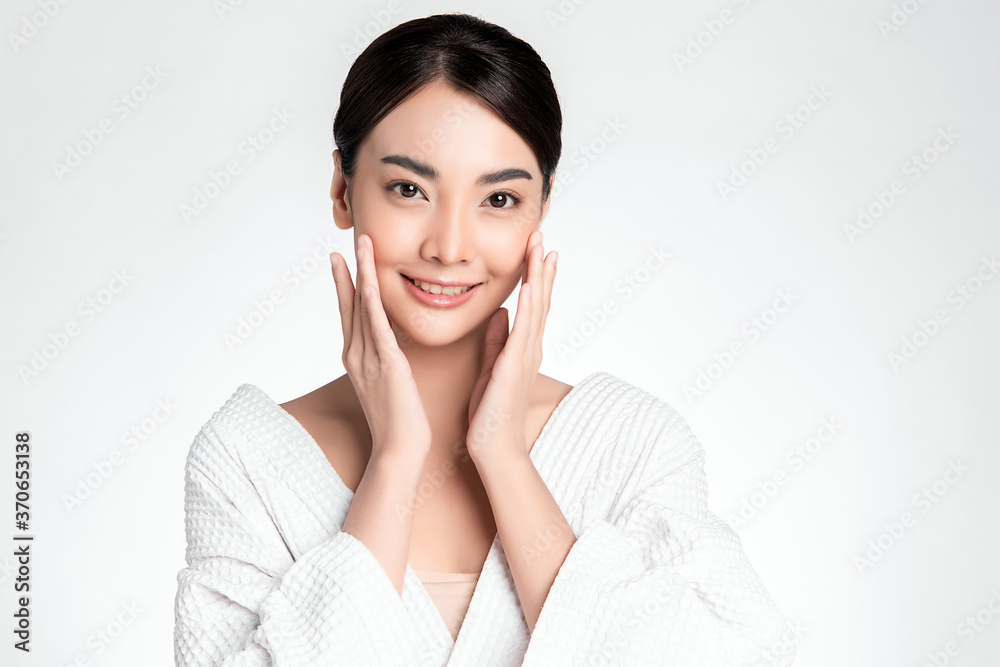 Beautiful Young asian Woman with Clean Fresh Skin, on white background, Face care, Facial treatment, Cosmetology, beauty and spa, Asian women portrait Beautiful Young asian Woman with Clean Fresh Skin, on white background, Face care, Facial treatment, Cosmetology, beauty and spa, Asian women portrait
