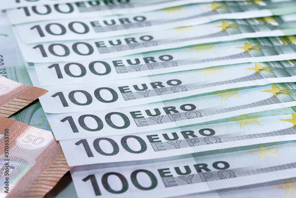 Heap of green houndred euro banknotes on each other Heap of green houndred euro banknotes on each other