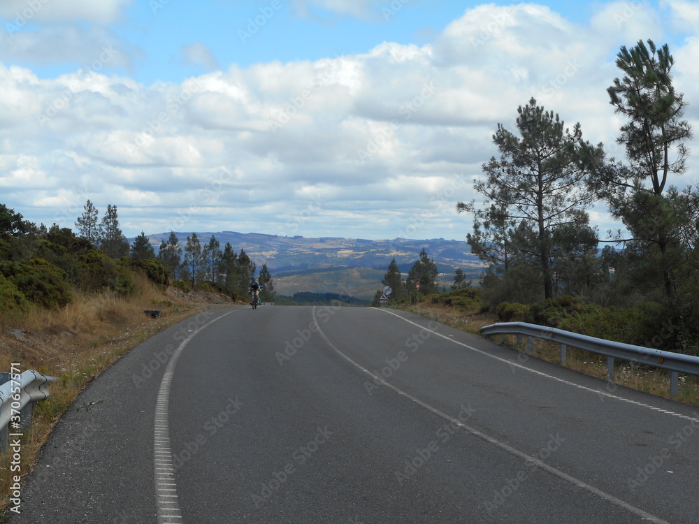 Fototapeta premium Empty country mountain road on a sunny day. Spain