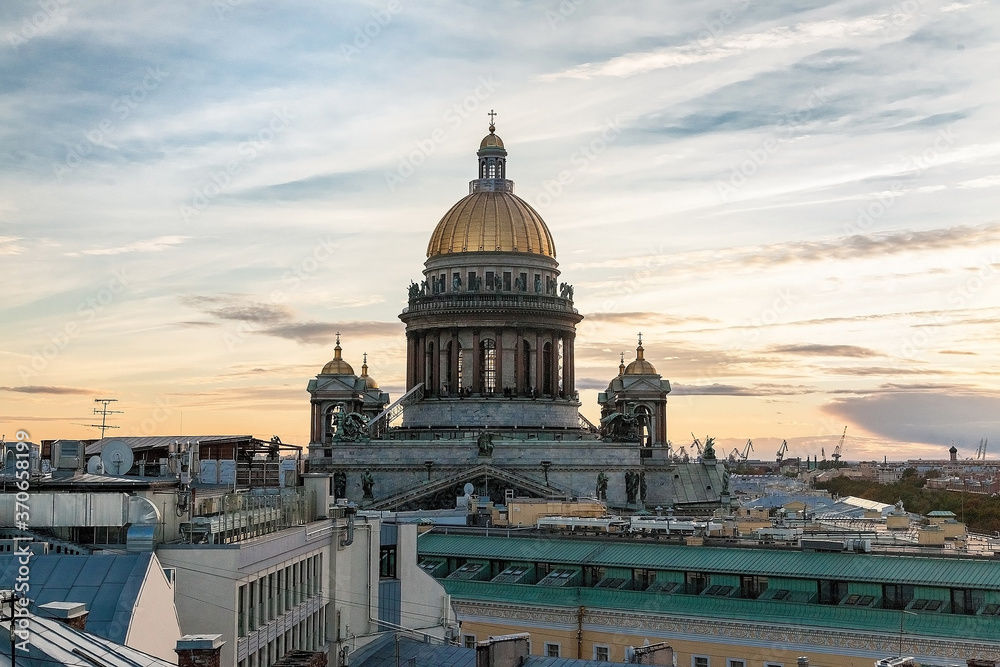 Rooftop cityscape of Saint Petersburg with St Isaac's cathedral in time of sunset