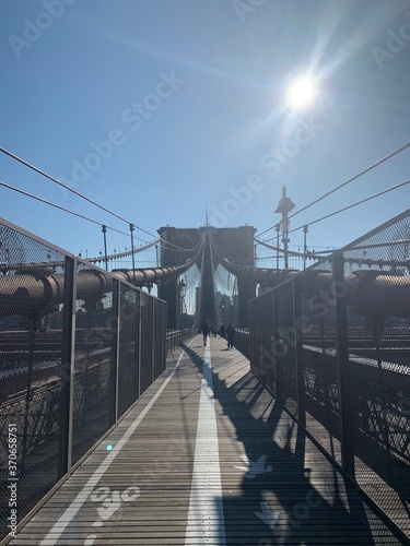 Sunny view of Brooklyn Bridge walkway 