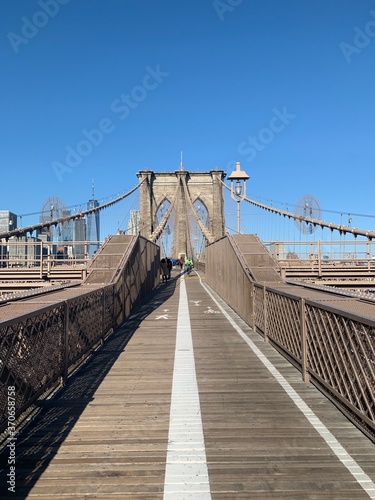 Sunny view of Brooklyn Bridge walkway 