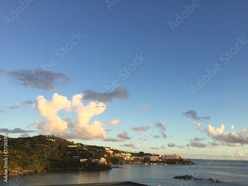 Landscape view of lush tropical coastline at sunset