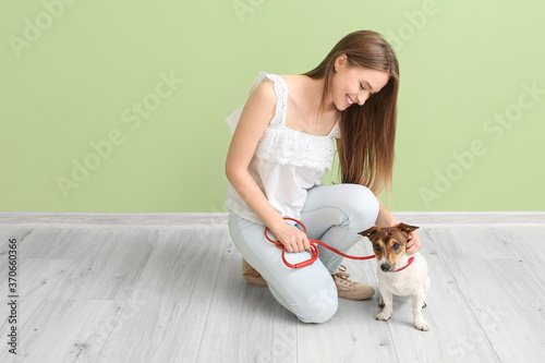Young woman with cute dog i...