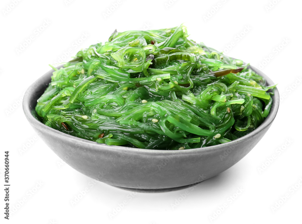Bowl with tasty seaweed salad on white background Bowl with tasty seaweed salad on white background