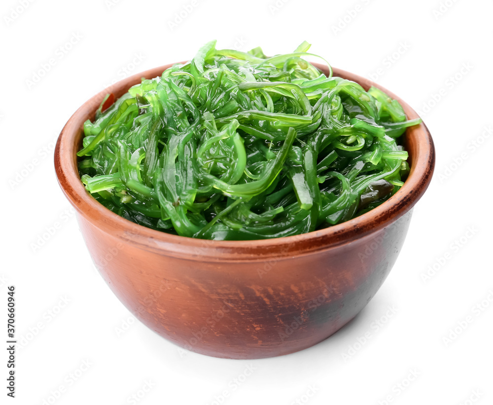 Bowl with tasty seaweed salad on white background Bowl with tasty seaweed salad on white background