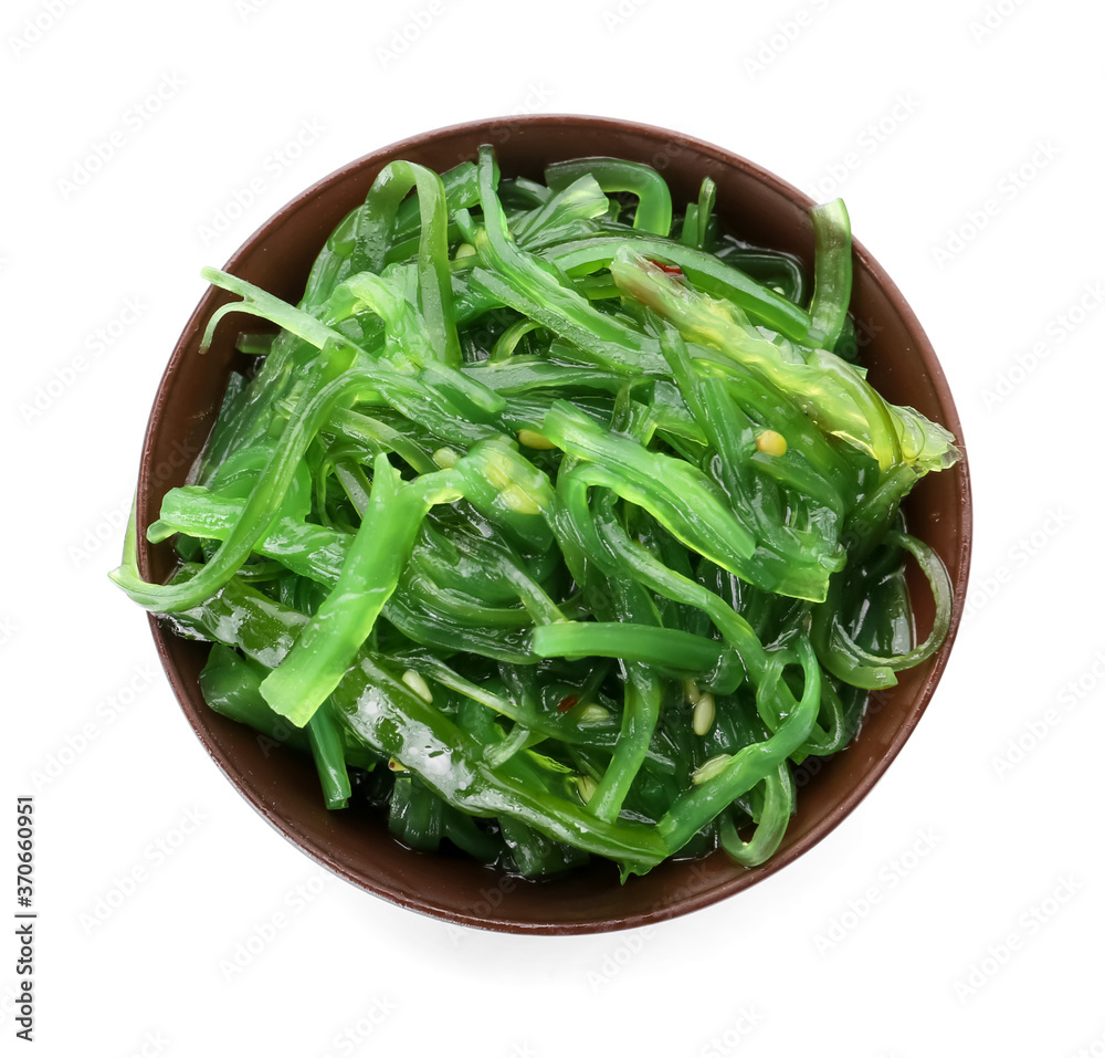 Bowl with tasty seaweed salad on white background Bowl with tasty seaweed salad on white background