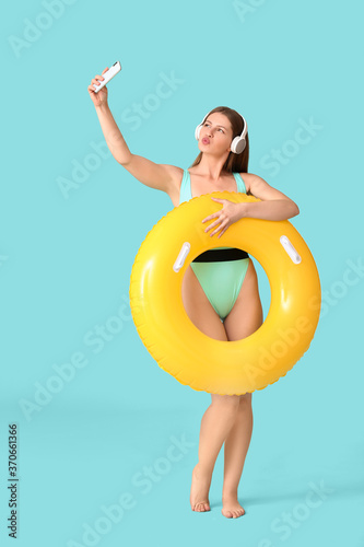 Young woman with headphones...