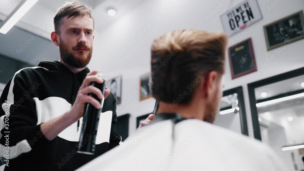 Fixing hair with hairspray. Slow motion. Fixing hair with hairspray. Slow motion.