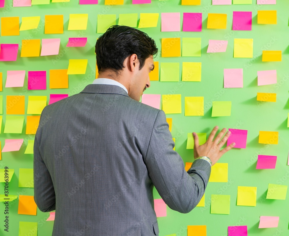 Businessman with many business priorities Businessman with many business priorities