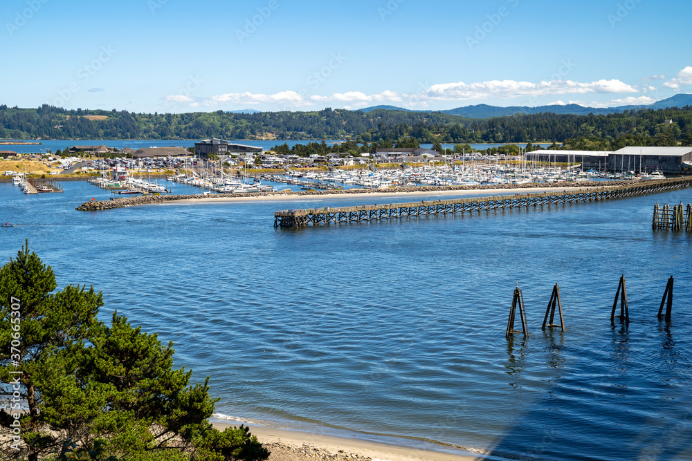 Fototapeta premium Docks and piers at the marina in Newport, Oregon during the summer