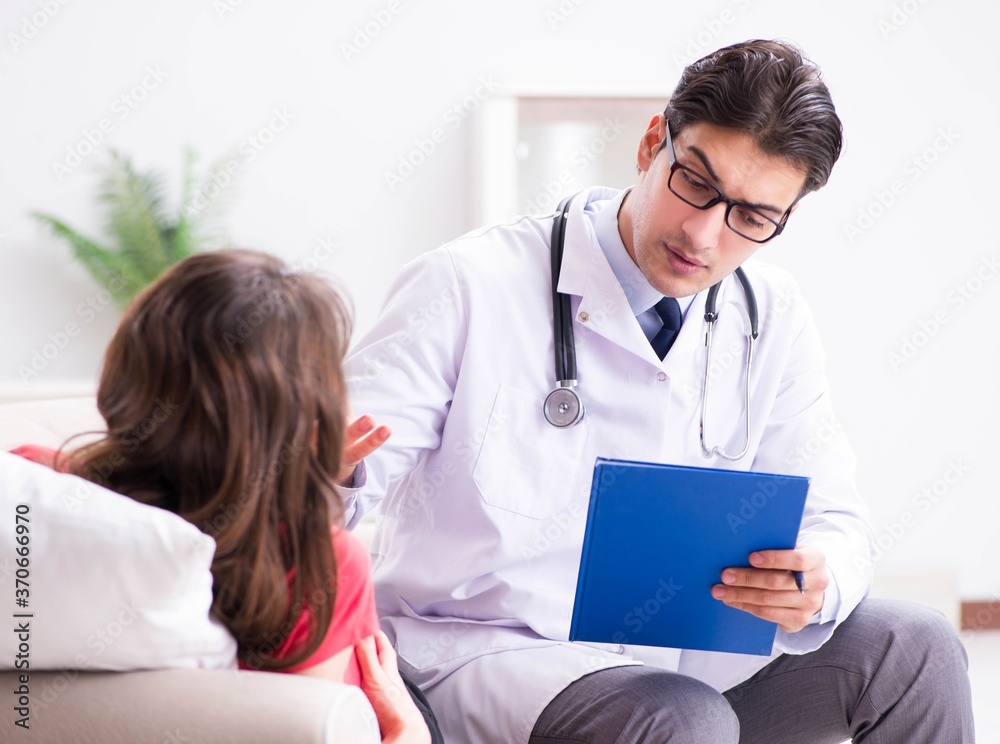 Pregnant woman patient visiting doctor for regular check-up Pregnant woman patient visiting doctor for regular check-up