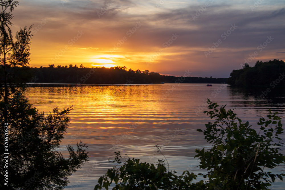 Fototapeta premium Still water reflections at sunset