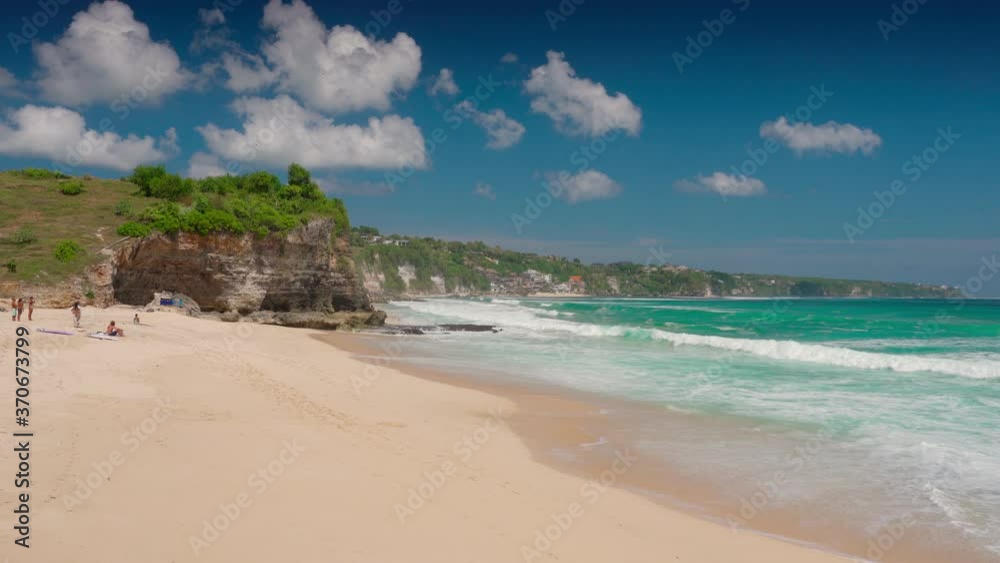Dreamland beach one of the most beautiful sand beach Bali as well as a popular surfing spot among active lifestyle travel tourist. Bali, Indonesia 4K Dreamland beach one of the most beautiful sand beach Bali as well as a popular surfing spot among active lifestyle travel tourist. Bali, Indonesia 4K