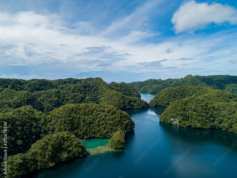 Aerial shot of tropical rock islands in calm tranquil secluded bay in Palau Micronesia