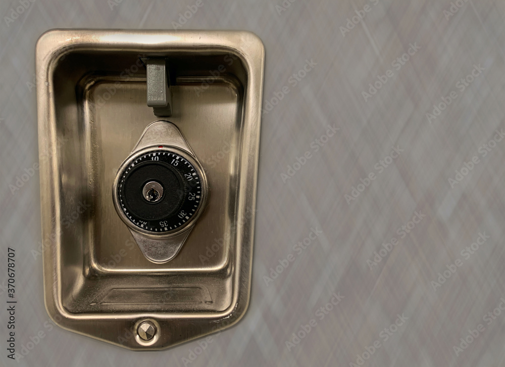 Up Close Locker Combination Lock on Abstract Background