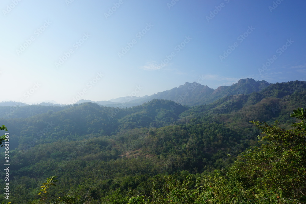  LANDSCAPE VIEW OF  OVERLAP GREEN MOUNTAIN WITH CLEAN BLUE SKY
