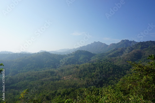  LANDSCAPE VIEW OF OVERLAP GREEN MOUNTAIN WITH CLEAN BLUE SKY