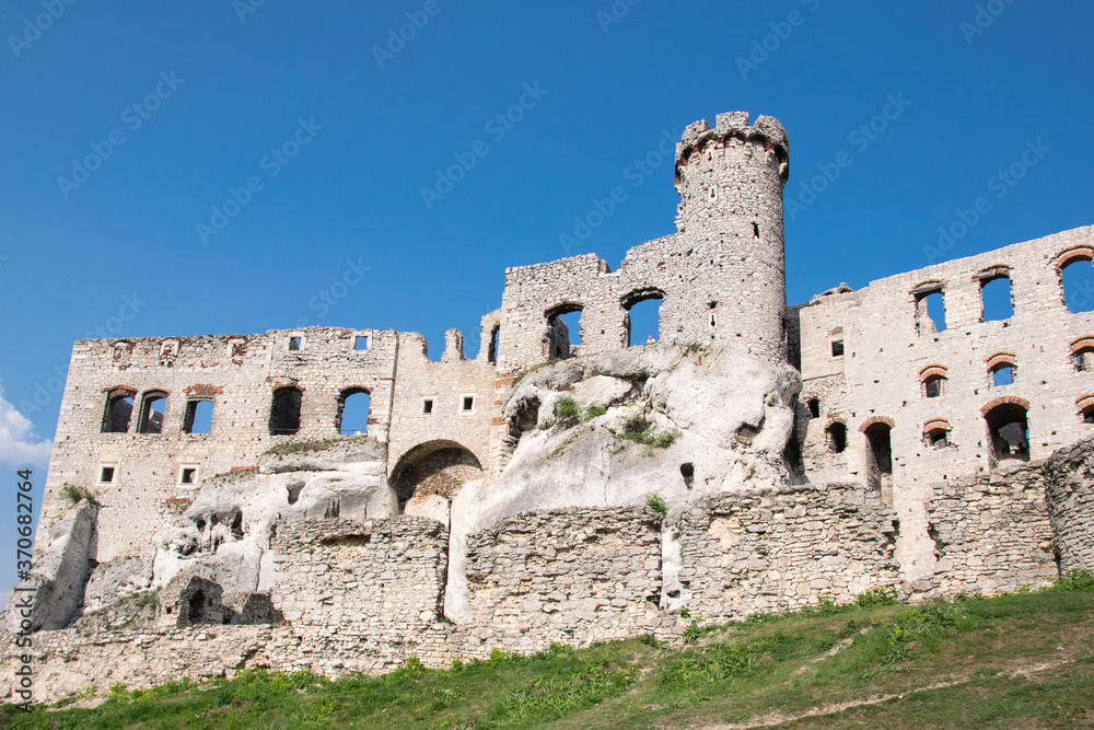 Ogrodzieniec castle on the background of blue sky