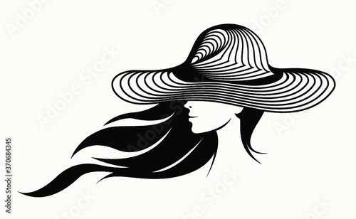 Woman with long, wavy hair flowing.Large brim sun hat.Fashion, style and beauty illustration.Young lady.Attractive female portrait.Profile view face.Accessory design.