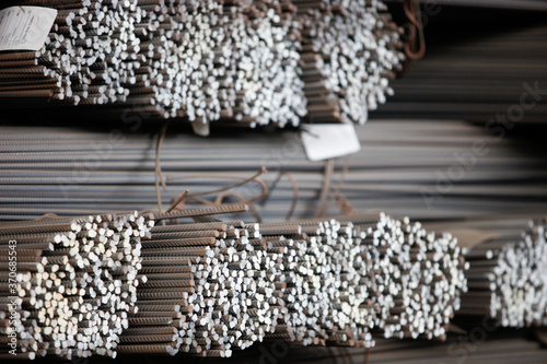 Building armature in the warehouse of metallurgical factory. Close-up of building armature.