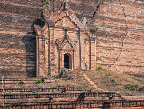 Ruined Mingun pagoda in Mingun paya Temple, Mandalay, Myanmar; ancient giant Buddhist stupa destroyed by an earthquake