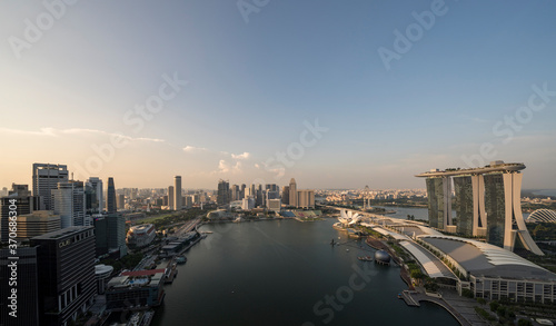Photography Wide panorama image of Marina Bay area in Singapore at dusk.