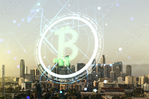 Virtual Bitcoin sketch on Los Angeles cityscape background. Double exposure