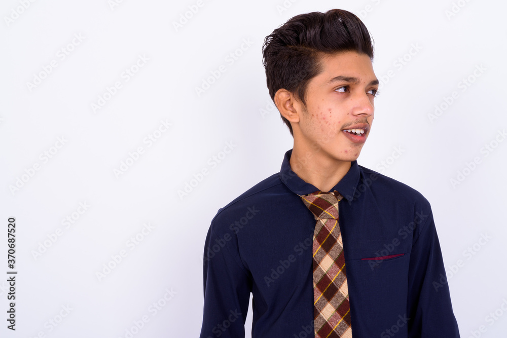 Portrait of young handsome Indian teenage boy as businessman Portrait of young handsome Indian teenage boy as businessman