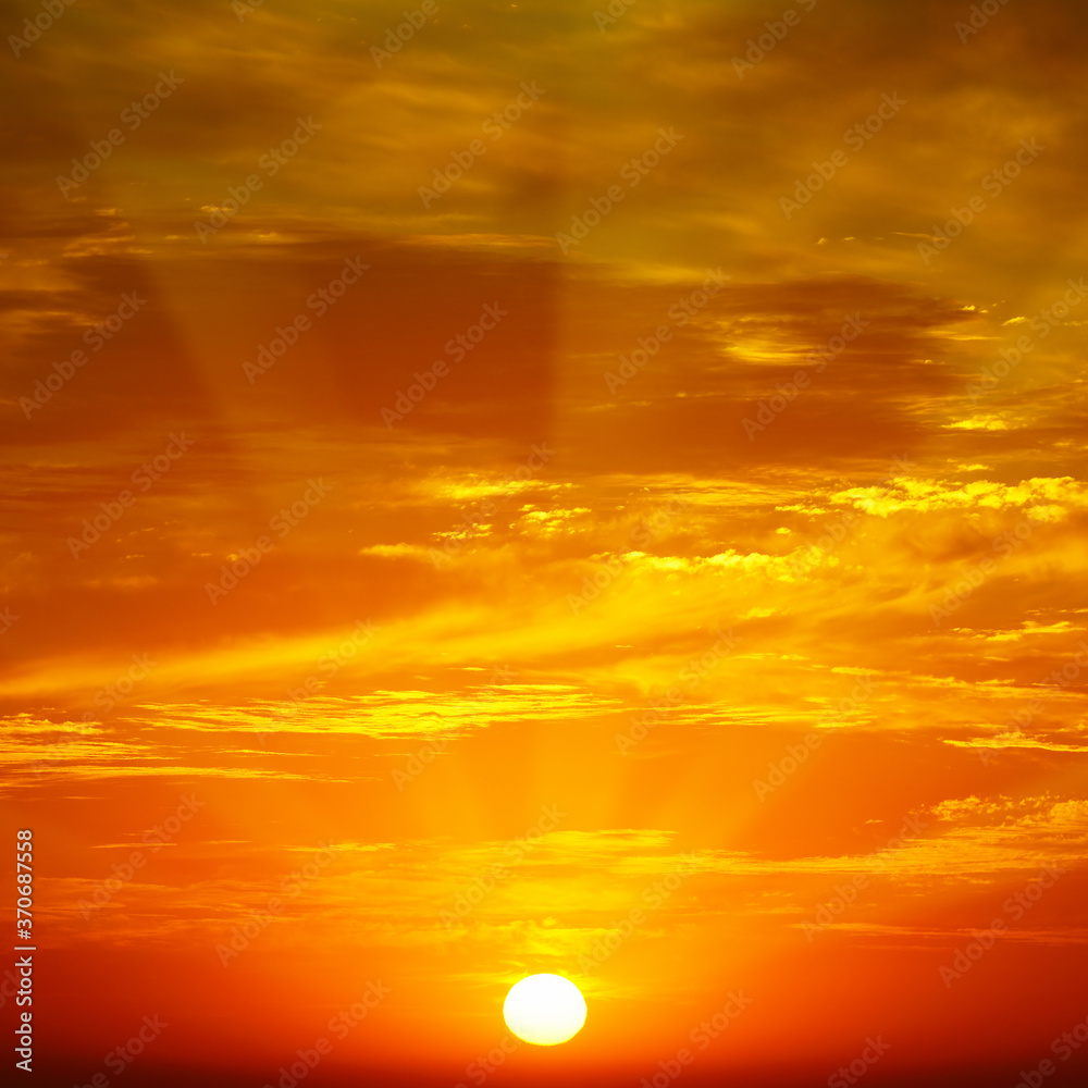 Clouds illuminated by sunlight.