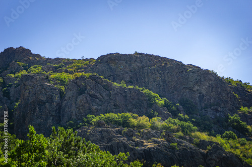 Early summer day in The Balkan mountain range near Sliven, Bulgaria. Also called "The old mountain" is a mountain range in the eastern part of the Balkan Peninsula. The Balkan range runs 557 km.