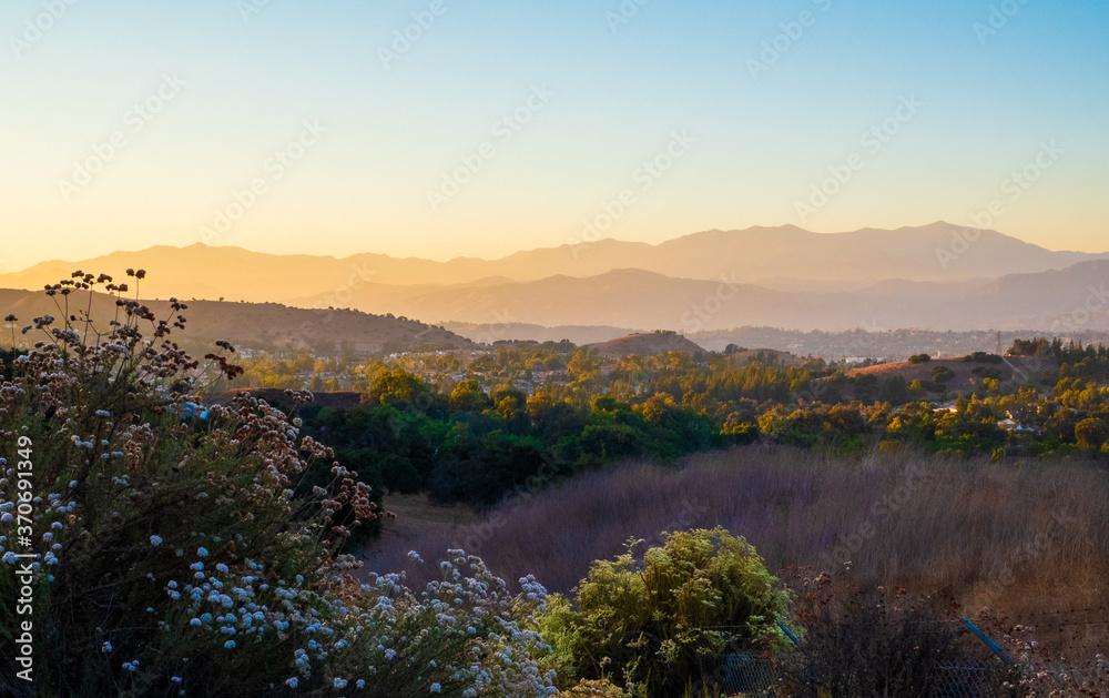 Landscape of Layered Mountains, trees, overlooking scenic town