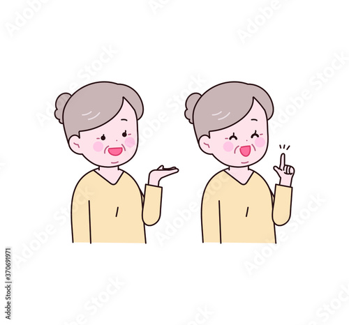 소개하는 제스쳐와 가리키는 제스쳐를 취하는 할머니.