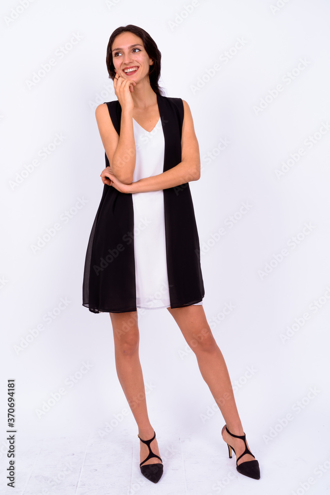 Portrait of happy young beautiful businesswoman against white background Portrait of happy young beautiful businesswoman against white background