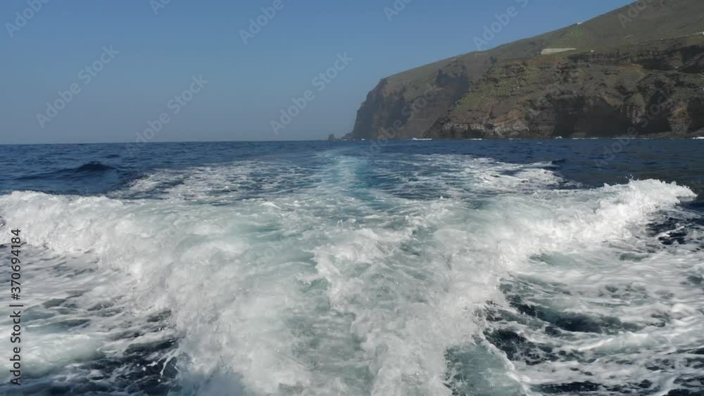 Rear View Of Motor Boat Wake On Open Ocean At High Speed, La Palma Rear View Of Motor Boat Wake On Open Ocean At High Speed, La Palma